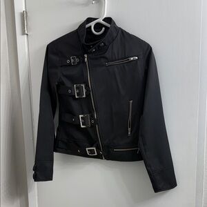 Sleek Black Women's Jacket with Buckle Details